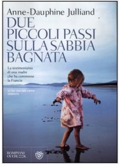 DUE PICCOLI PASSI SULLA SABBIA BAGNATA